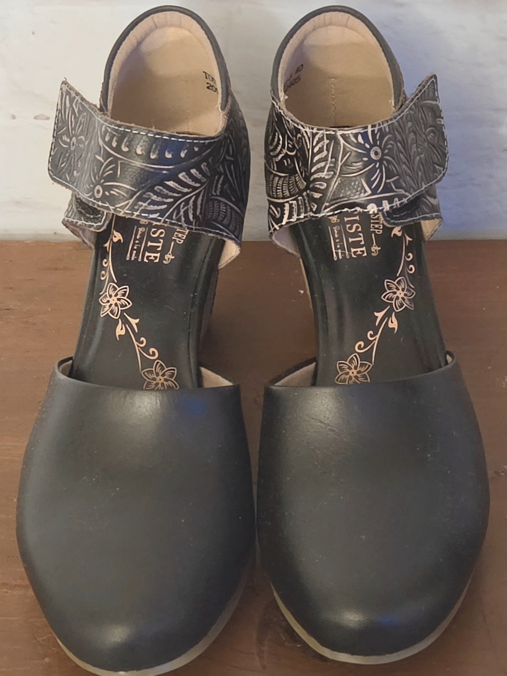 A'artiste Black Leather Clogs with Embossed Ankle Strap